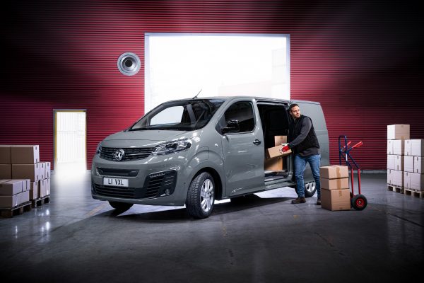 Man loading Vauxhall Vivaro-e