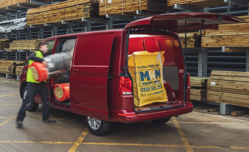 man loading a van - many van drivers overload their vehicle every year